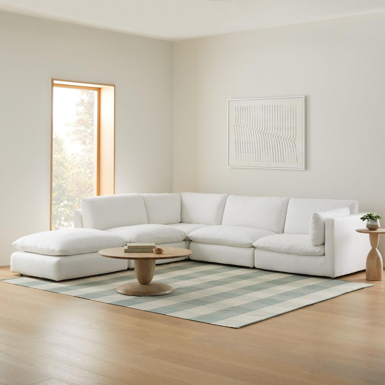 <p><a href="https://go.redirectingat.com?id=74968X1596630&url=https%3A%2F%2Fwww.westelm.com%2Fproducts%2Fhampton-5-piece-chaise-sectional-h6868&sref=https%3A%2F%2F" rel="nofollow noopener" target="_blank" data-ylk="slk:Shop Now;elm:context_link;itc:0;sec:content-canvas" class="link rapid-noclick-resp">Shop Now</a></p><p>Hampton Modular 5-Piece Sectional (125")</p><p>westelm.com</p><p>$4396.00</p>