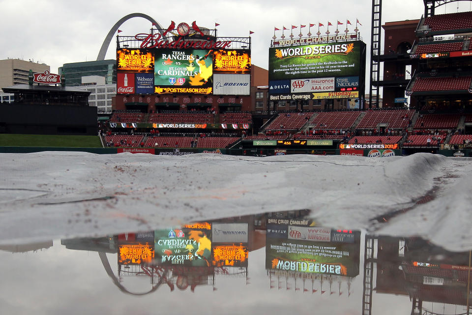 ST LOUIS, MO - OCTOBER 19: A rain tarp covers the infield at Busch Stadium prior to Game One of the MLB World Series between the Texas Rangers and St Louis Cardinals on October 19, 2011 in St Louis, Missouri. (Photo by Doug Pensinger/Getty Images)