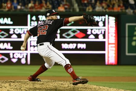 Jun 19, 2018; Washington, DC, USA; Washington Nationals relief pitcher Sean Doolittle (62) pitches during the ninth inning against the Baltimore Orioles at Nationals Park. Mandatory Credit: Tommy Gilligan-USA TODAY Sports