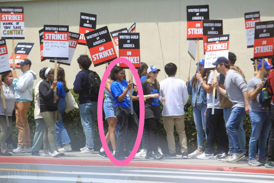 Mindy Kaling with protesters