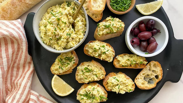 Lemony Artichoke Crostini on a tray