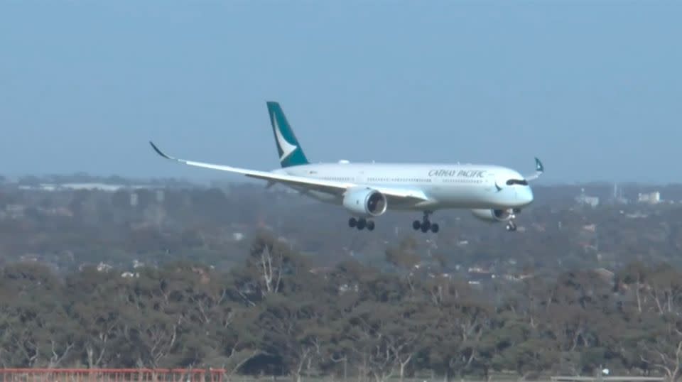 Wild winds sent a Cathay Pacific flight wobbling from side to side moments before it touched down. Source: Storyful