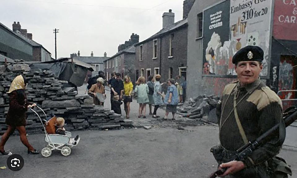 A British soldier patrols in a Belfast neighborhood in 1969 during “the Troubles.”