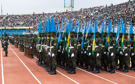 Rwandan army parades before the swearing-in of President-elect Paul Kagame at Amahoro stadium in Kigali, Rwanda, August 18, 2017. REUTERS/Jean Bizimana