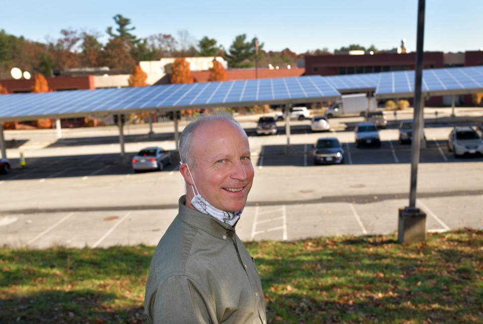 John Odell, the city’s chief sustainability officer, outside of Sullivan Middle School where solar panels are in use Nov. 9, 2020.