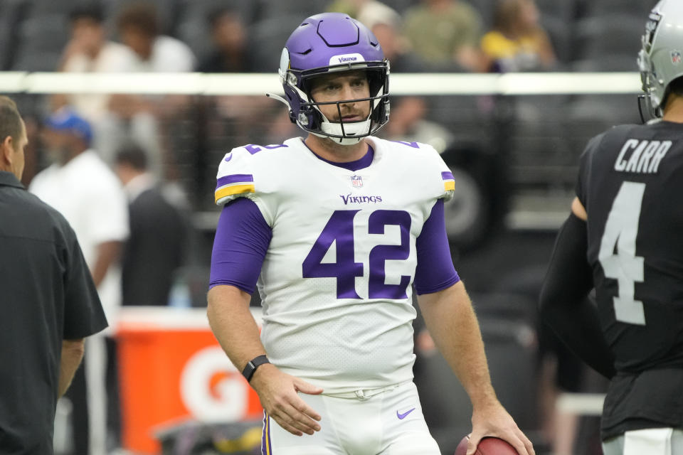 FILE - Minnesota Vikings long snapper Andrew DePaola (42) is shown during the first half of an NFL preseason football game against the Las Vegas Raiders, Sunday, Aug. 14, 2022, in Las Vegas. DePaola broke into the NFL in 2014 with Tampa Bay. When kicker Connor Barth was cut at the end of training camp that year, DePaola moved into Barth’s home temporarily. He slept on the couch cushions in the otherwise empty house for a few weeks until the sale closed and he had to be out for good. (AP Photo/Rick Scuteri, File)