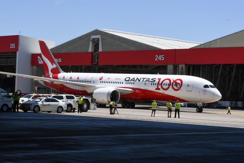 Qantas flight QF7879, which flew direct from London to Sydney, arrives at the hangar for the Qantas Centenary Launch at Qantas Sydney Jet Base in Sydney