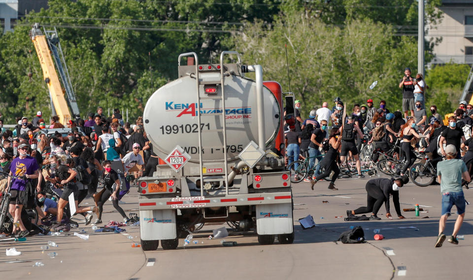 A tanker truck drives into thousands of protesters marching on 35W north bound highway during a protest against the death in Minneapolis police custody of George Floyd, in Minneapolis, Minnesota, U.S. May 31, 2020. REUTERS/Eric Miller (Photo: Eric Miller / Reuters)