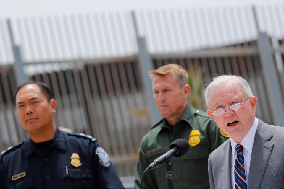 U.S. Attorney General Jeff Sessions holds a news conference next to the U.S.-Mexico border in San Diego to discuss immigration enforcement actions on May 7. A month earlier, he announced the administration's "zero tolerance" policy. (Photo: Mike Blake / Reuters)