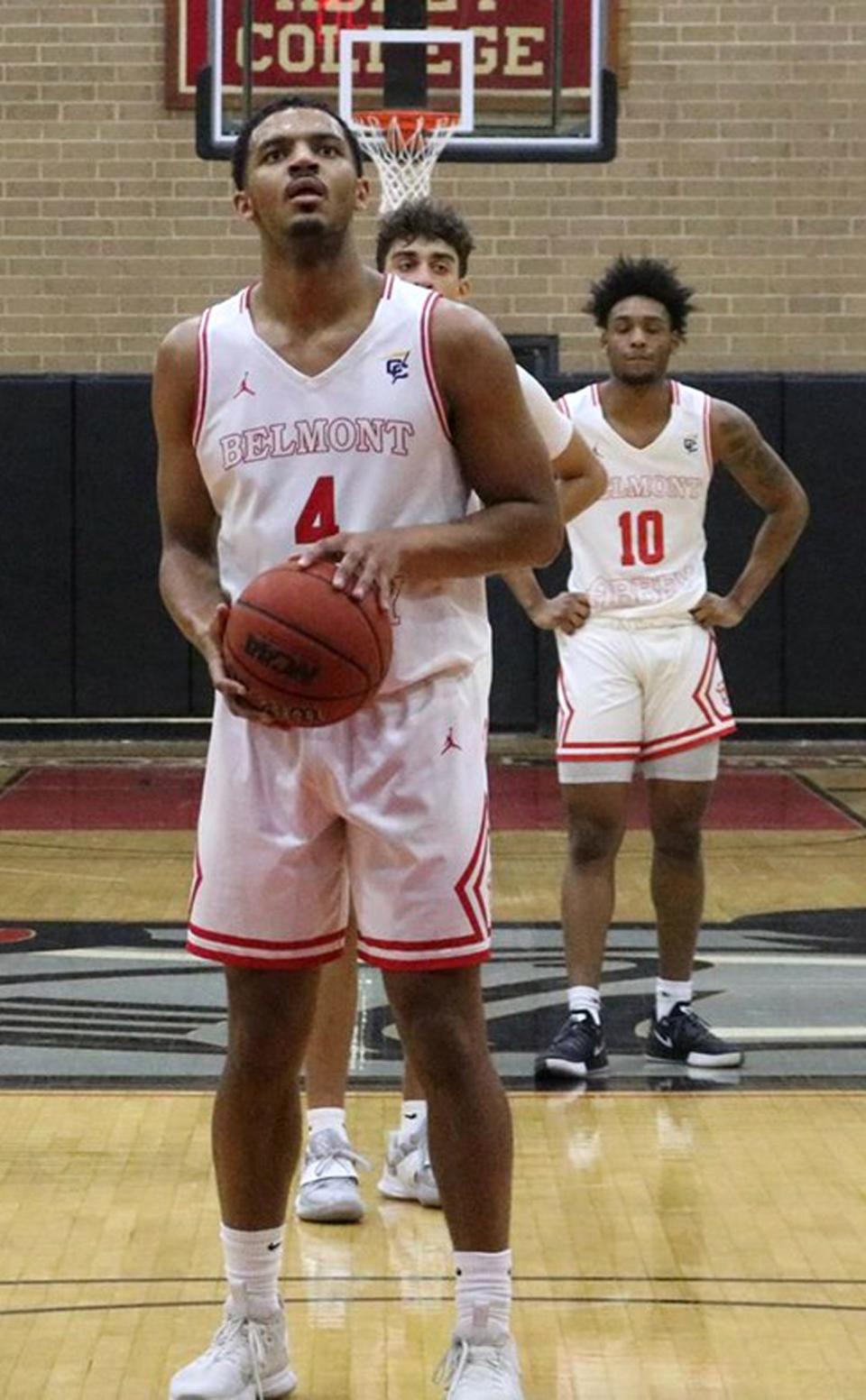 Belmont Abbey basketball player Charles Solomon prepares to shoot a free throw in a recent game. The junior forward has recently started a marketing company, Solomon Media Management, that helps local companies with their social media engagement.