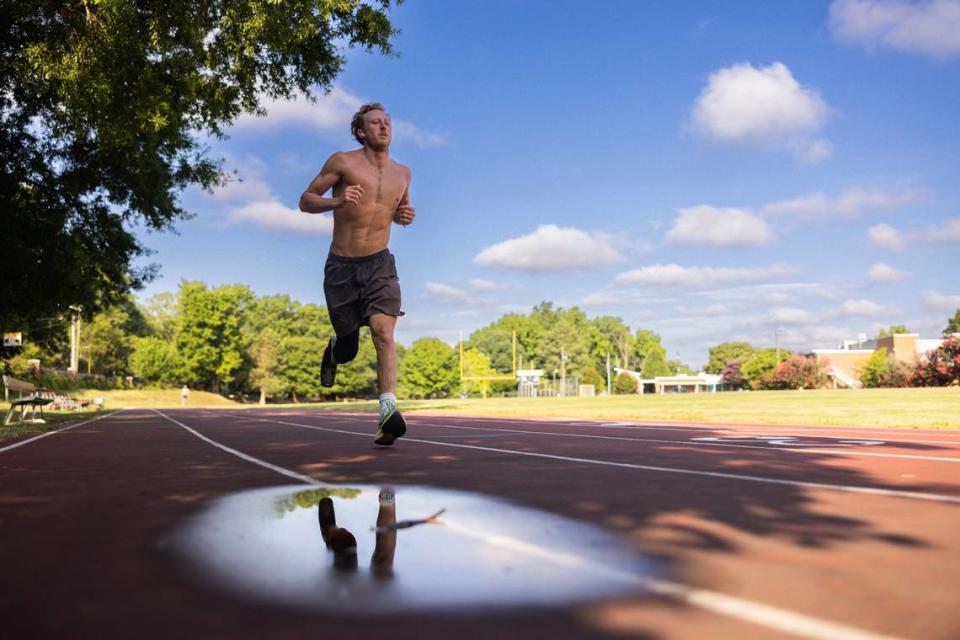 Carson Clough trains for the Paralympics triathlon at Alexander Graham Middle School in Charlotte, N.C., on Saturday, July 6, 2024.