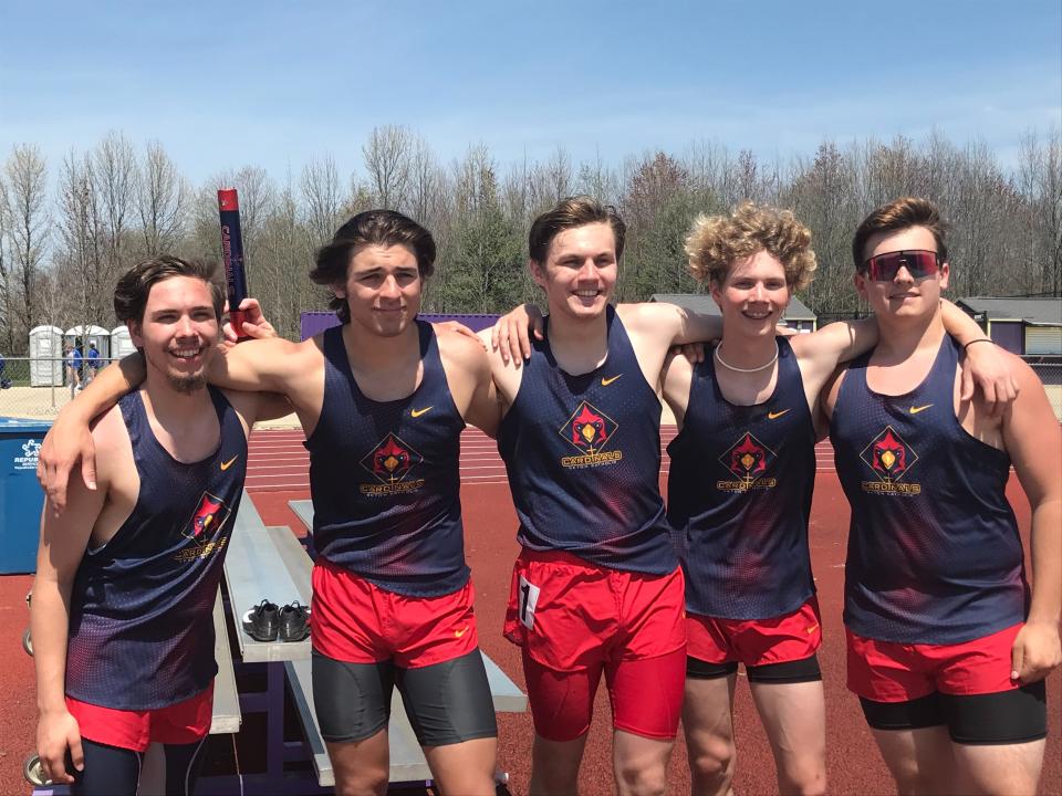 Members of the Seton boys track team pose after their performance April 23, 2022, at the Guerin Catholic Invite.