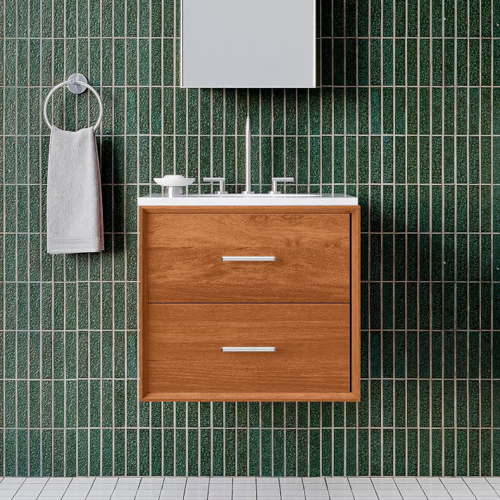 <p><a href="https://go.redirectingat.com?id=74968X1596630&url=https%3A%2F%2Fwww.westelm.com%2Fproducts%2Fmid-century-floating-single-bathroom-vanity-24-49-b4126&sref=https%3A%2F%2Fwww.elledecor.com%2Fshopping%2Ffurniture%2Fg60536804%2Fbest-small-bathroom-vanities%2F" rel="nofollow noopener" target="_blank" data-ylk="slk:Shop Now;elm:context_link;itc:0;sec:content-canvas" class="link rapid-noclick-resp">Shop Now</a></p><p>Midcentury Floating Single Bathroom Vanity</p><p>westelm.com</p><p>$1071.00</p><span class="copyright">West Elm</span>