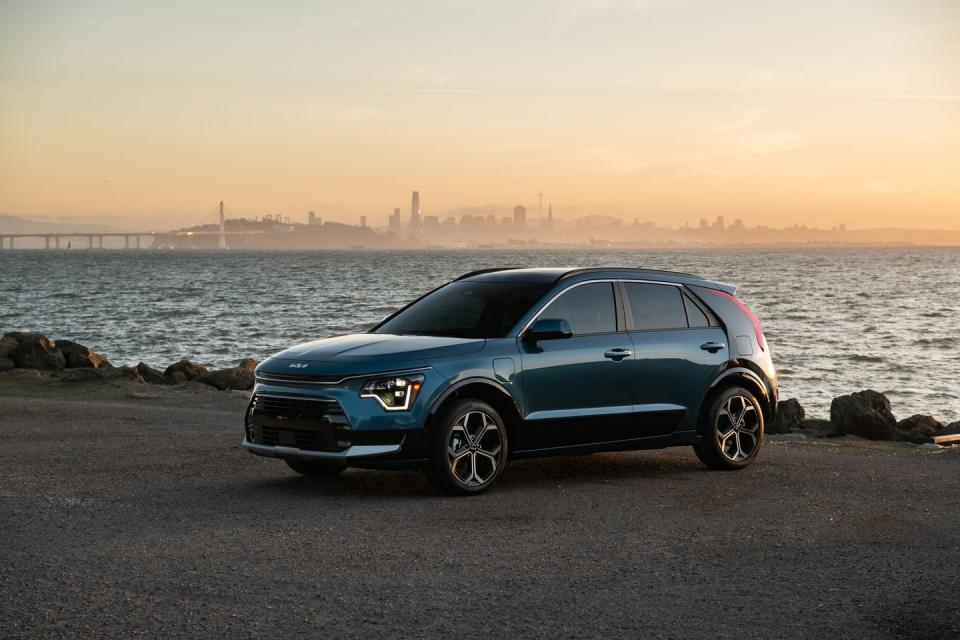 <p>Now in its second generation, the 2023 Kia Niro changes the script on its available plug-in powertrain. No longer a plug-in analog to the plug-less Niro hybrid, the latest Niro PHEV retains its ability to motor about for miles (approximately 33 by Kia's estimates—seven more miles than we saw in <a href="https://www.caranddriver.com/reviews/comparison-test/a41936513/2023-kia-niro-hybrid-phev-by-the-numbers/" rel="nofollow noopener" target="_blank" data-ylk="slk:our testing;elm:context_link;itc:0;sec:content-canvas" class="link ">our testing</a>) on battery power alone, but now adds extra power to the mix. With a combined 180 horsepower on tap, the Niro PHEV outmuscles its hybrid counterpart by 41 horses. This allowed the PHEV to hit the mile-a-minute mark in 7.3 seconds under our watch, notably better than the 8.9-second time we recorded in the hybrid.</p><ul><li>Base price: $35,165</li><li>Estimated electric driving range: 33 miles</li></ul><p><a class="link " href="https://www.caranddriver.com/kia/niro" rel="nofollow noopener" target="_blank" data-ylk="slk:MORE ABOUT THE KIA NIRO PHEV;elm:context_link;itc:0;sec:content-canvas">MORE ABOUT THE KIA NIRO PHEV</a></p>