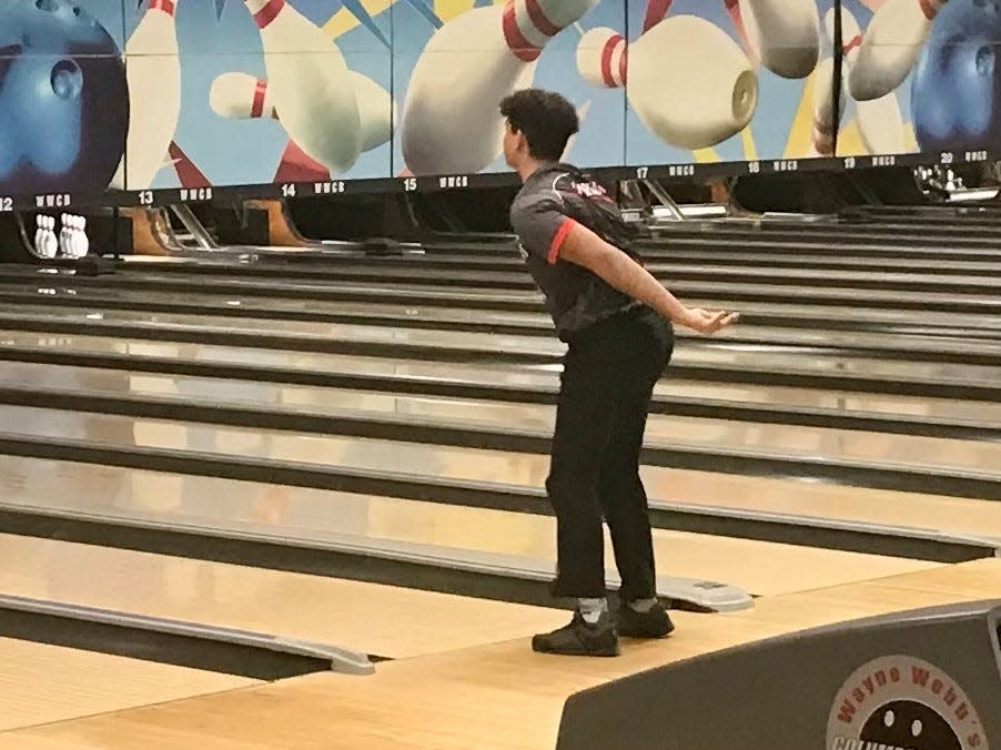 Pleasant's Logan Clemons watches a shot during the Division II boys bowling state tournament at Wayne Webb's Columbus Bowl last year.