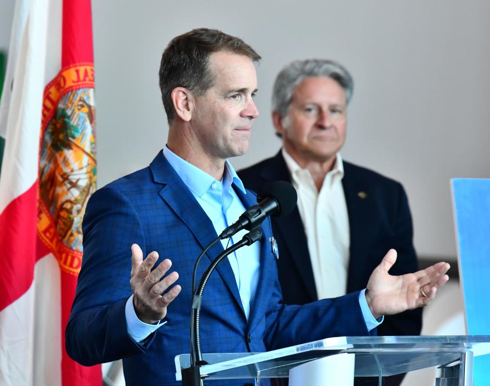 Princess Cruises President John Padgett talks about Caribbean Princess sailing from Port Canaveral as Port Canaveral CEO John Murray stands in the background during a Tuesday press conference.