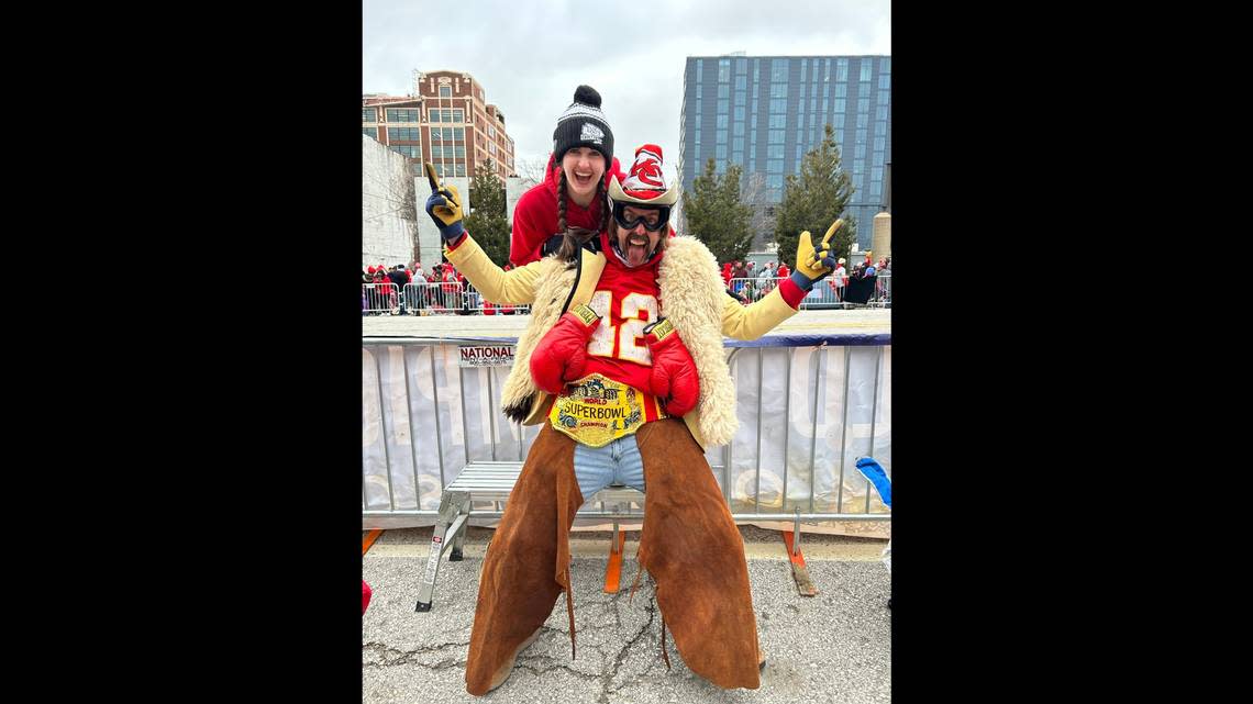 Mallory Mong and her father, Grant Mong, cheer on the Chiefs at the Super Bowl parade on Wed. Feb. 15, 2023.