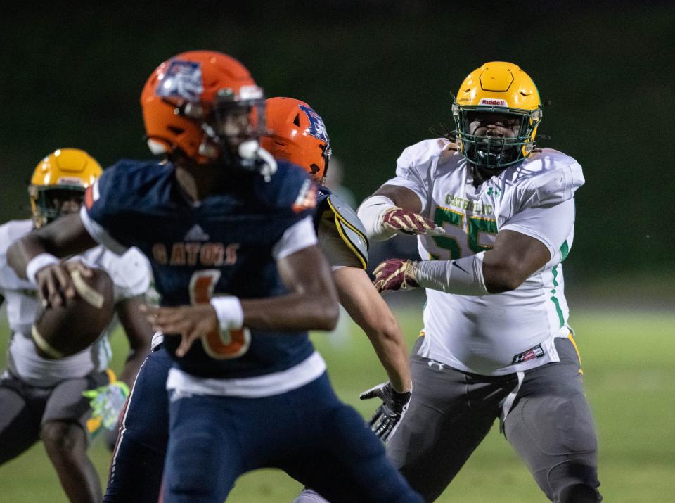 Desjon Robertson (55) tries to get to the quarterback during the Pensacola Catholic vs Escambia football game at Escambia High School in Pensacola on Friday, Sept. 1, 2023.
