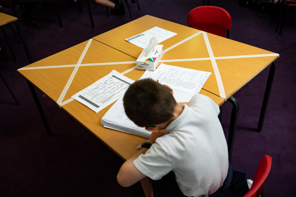 Social distancing measures as a child studies on a marked table at Kempsey Primary School in Worcester. Nursery and primary pupils could return to classes from June 1 following the announcement of plans for a phased reopening of schools. (Photo by Jacob King/PA Images via Getty Images)