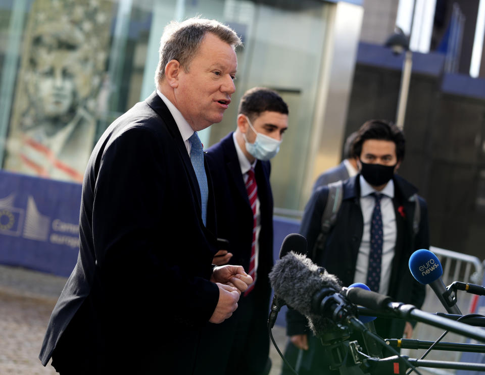 United Kingdom's chief Brexit negotiator David Frost speaks with the media outside EU headquarters in Brussels, Friday, Nov. 5, 2021. The UK's chief Brexit negotiator David Frost meets his EU counterpart Maros Sefcovic on Friday to discuss outstanding issues regarding trade in Northern Ireland. A fishing row between Britain and France is further complicating issues between the EU and recently departed Britain. (AP Photo/Virginia Mayo)