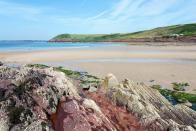 <p>This superb cove on the Pembrokeshire Coast Path is overlooked by a 12th-century castle. It's popular for surfing and watersports, but great for rockpooling with the kids, too. There's disabled access and dogs are welcome at Manorbier Bay if you're looking for a pet-friendly holiday on one of Wales' best beaches. </p><p><strong>Where to stay: </strong>Check into the unusual Sea Shed in the village of Manorbier for a quirky romantic break. The rental for two is just a five-minute walk to the sea and has an outdoor shower overlooking the woodland, a freestanding bath tub and outdoor seating.</p><p><a class="link " href="https://airbnb.pvxt.net/KemxM7" rel="nofollow noopener" target="_blank" data-ylk="slk:SEE INSIDE;elm:context_link;itc:0;sec:content-canvas">SEE INSIDE</a></p>