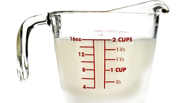 Milk in a measuring cup