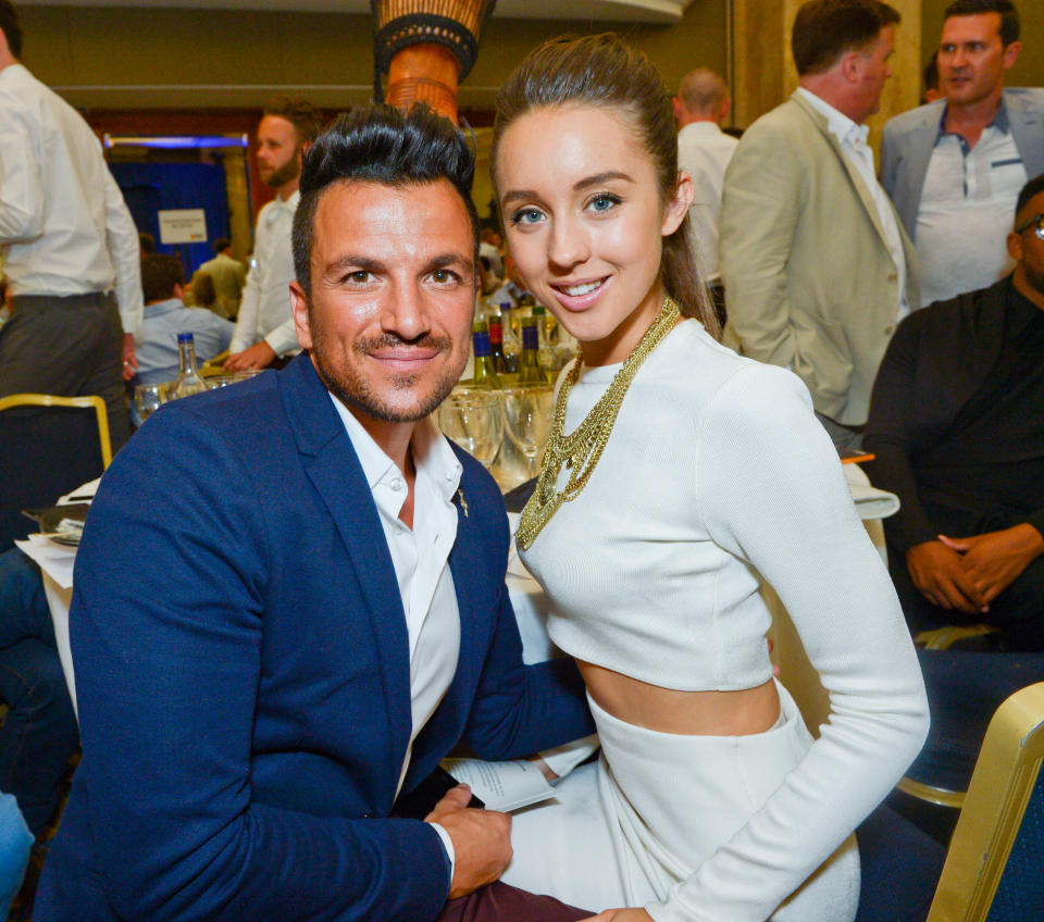 Peter Andre and fiancée Emily MacDonagh during the Nordoff Robbins O2 Silver Clef Awards 2014 at  the Hilton Hotel in London on Friday,  July  4, 2014. (Photo by Jon Furniss/Invision/AP) 