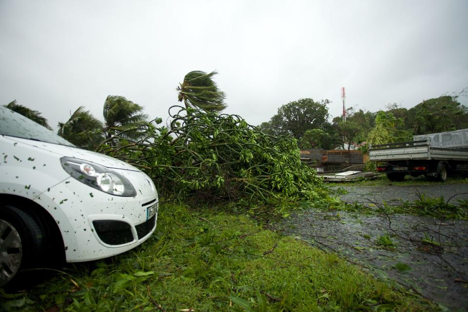 A picture taken on Sept. 19, 2017, shows the powerful winds and rains of Hurricane Maria battering the city of Petit-Bourg, Guadeloupe.