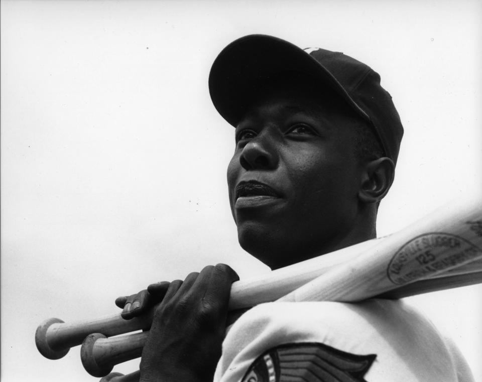 The Milwaukee Braves' Hank Aaron poses for a portrait in 1957.  (Photo: Rogers Photo Archive via Getty Images)