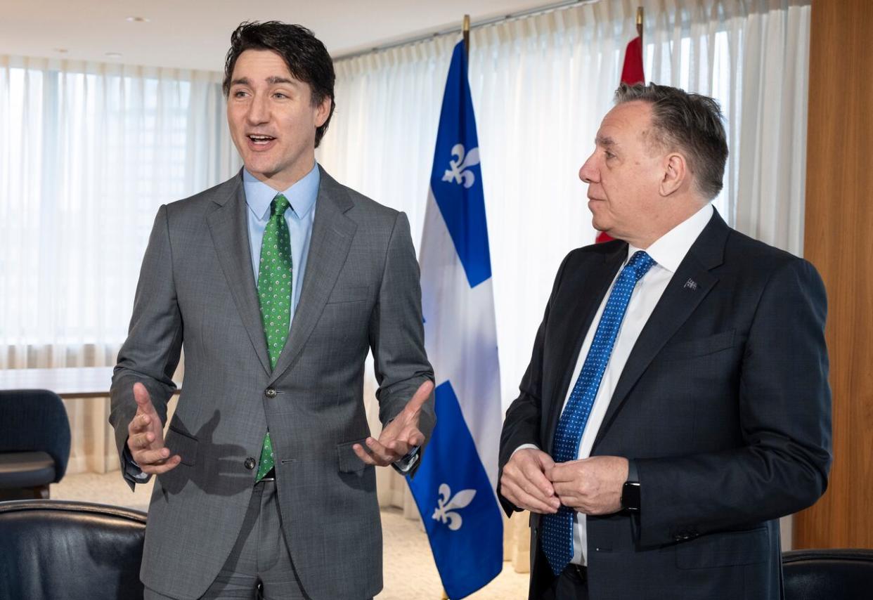 Prime Minister Justin Trudeau, left, attended a bilateral meeting with Quebec Premier François Legault in Montreal on Friday. (Christinne Muschi/The Canadian Press - image credit)
