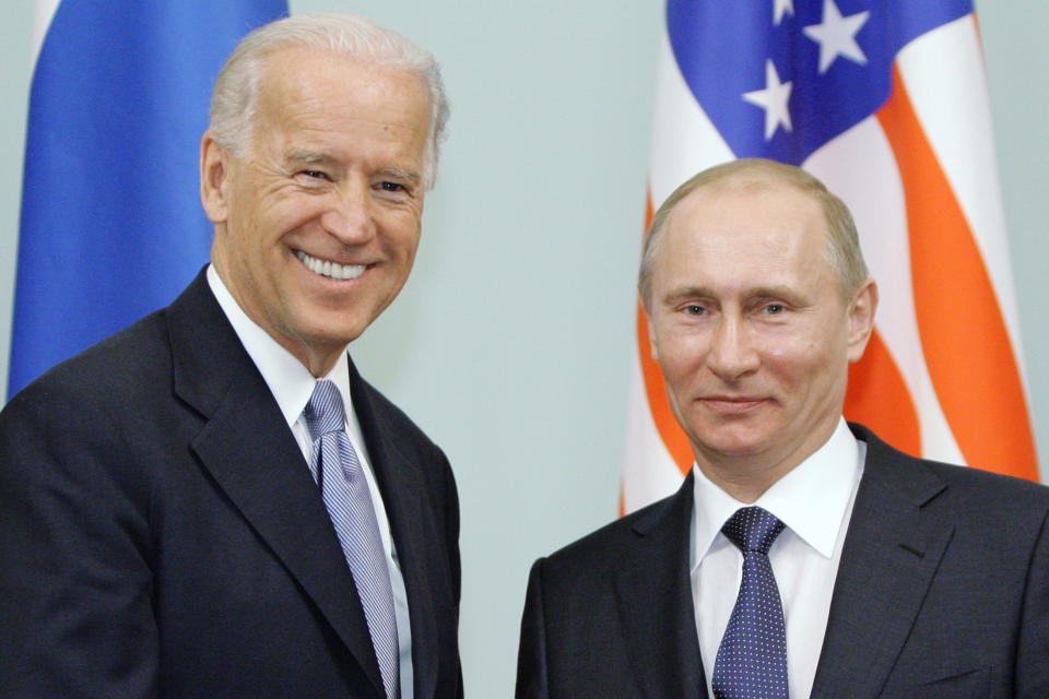 FILE - In this March 10, 2011 file photo, then Vice President Joe Biden, left, shakes hands with Russian Prime Minister Vladimir Putin in Moscow, Russia. At a low point in U.S.-Russian relations, President Joe Biden and Russian President Vladimir Putin appear to agree broadly on at least one thing — their first face-to-face meeting is a chance to set the stage for a new era in arms control. (RIA Novosti, Alexei Druzhinin/Pool via AP, file)