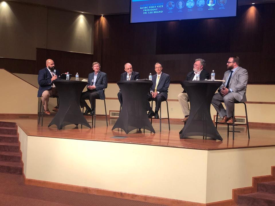 Lee Brand, first vice president of the Southern Baptist Convention, speaks with Randy Adams, Tom Ascol, Russell Fuller, Rod Martin and Allen Nelson Friday at Mid-America Baptist Theological Seminary. The event was promoted by the Conservative Baptist Network.