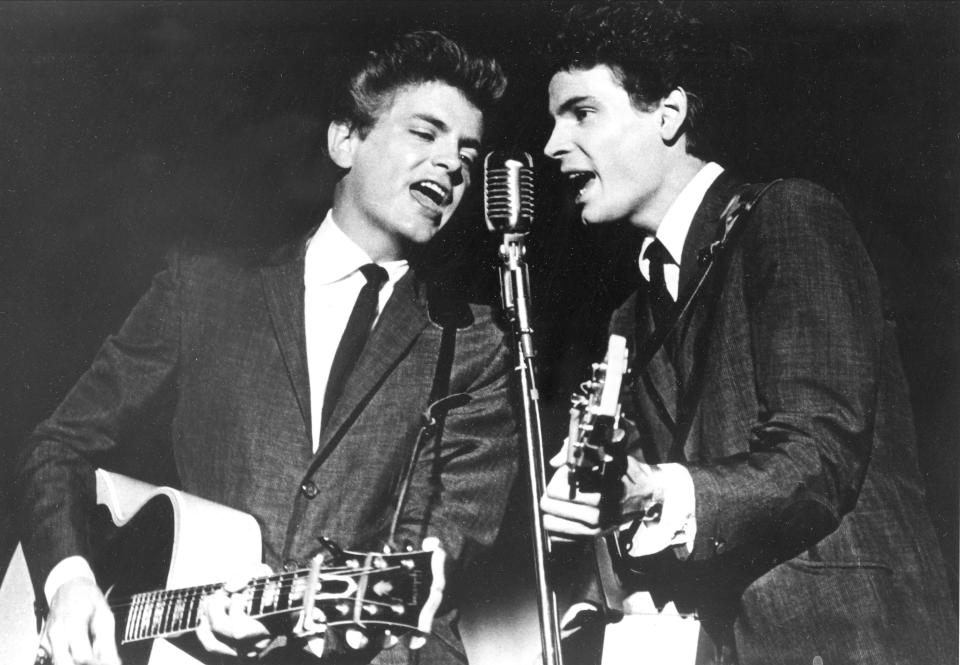 FILE - This July 31, 1964 file photo shows The Everly Brothers, Don and Phil, performing on stage. Everly, who with his brother Don formed an influential harmony duo that touched the hearts and sparked the imaginations of rock 'n' roll singers for decades, including the Beatles and Bob Dylan, died Friday, Jan. 3, 2014. He was 74. Everly died of chronic obstructive pulmonary disease at a Burbank hospital, said his son Jason Everly. (AP Photo, File)