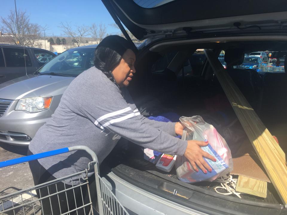 Mashantucket resident Tonya Dames picked up supplies Monday for her family's Easter get-together.