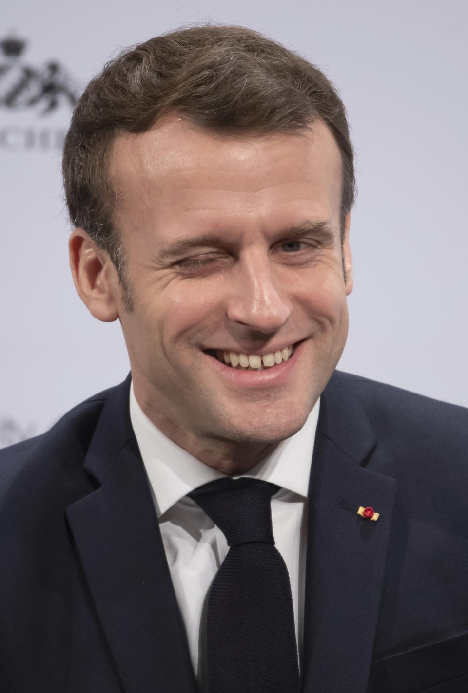 French President Emmanuel Macron attends a session on the second day of the Munich Security Conference in Munich, Germany, Saturday, Feb. 15, 2020. (Sven Hoppe/dpa via AP)