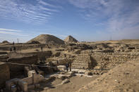 CORRECTS DAY OF WEEK TO SUNDAY -- The excavation site where Egyptian archaeologist Zahi Hawass and his team unearthed a trove of ancient coffins, artifacts, and skulls in a vast necropolis south of Cairo, Sunday, Jan. 17, 2021, in Saqqara, south of Cairo, Egypt. (AP Photo/Nariman El-Mofty)