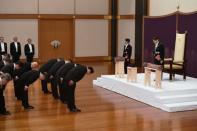 Japan's Emperor Naruhito, flanked by Crown Prince Akishino, attends a ritual called Kenji-to-Shokei-no-gi, a ceremony for inheriting the imperial regalia and seals, at the Imperial Palace in Tokyo, Japan May 1, 2019. Japan Pool/Pool via REUTERS