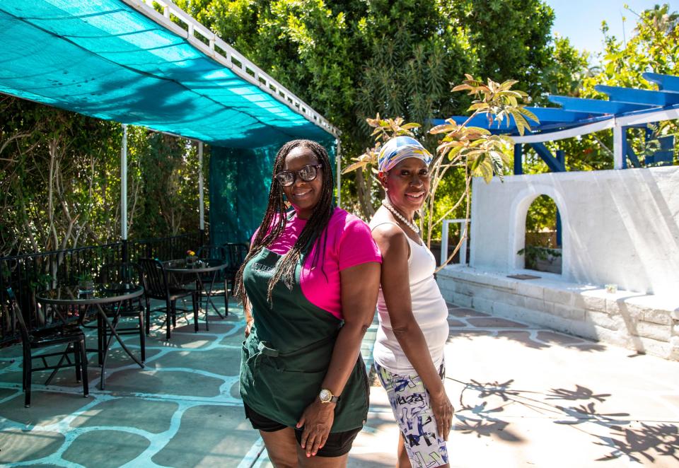 Owner Tina Motley (left) and friend and collaborator Latrice Hudson pose for a photo Friday at Le Petit Dejeuner in Cathedral City.