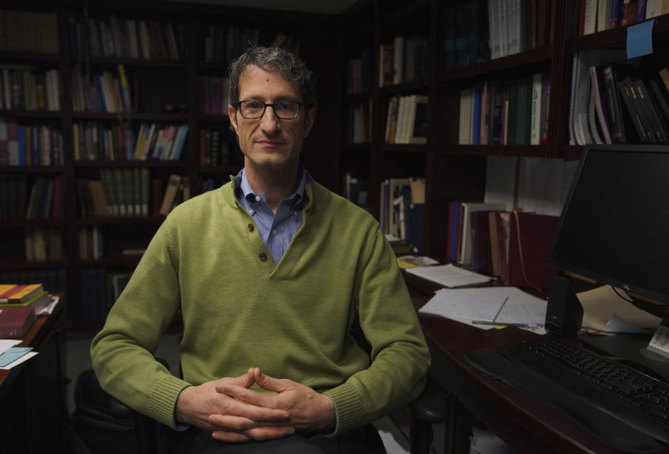 Senior Rabbi Seth Adelson sits for a portrait in his office at Congregation Beth Shalom in the Squirrel Hill neighborhood of Pittsburgh on Tuesday, Dec. 6, 2022. (AP Photo/Jessie Wardarski)