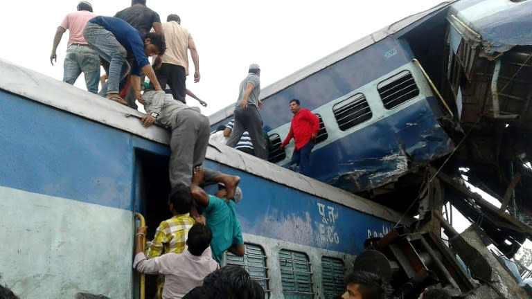 Local residents search for survivors of the train crash