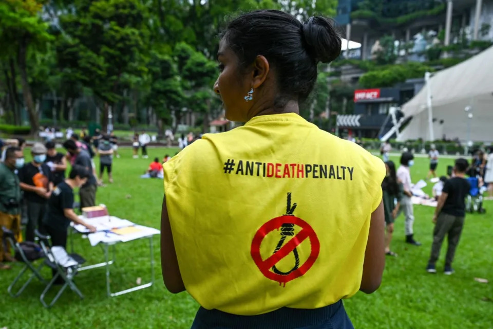 An activist wears a T-shirt with a sign against the death penalty during a protest against the death penalty at Speakers’ Corner in Singapore (AFP via Getty Images)