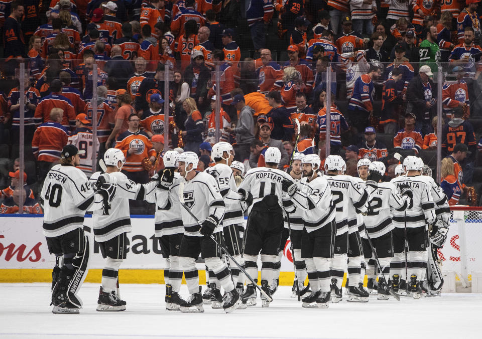 Los Angeles Kings celebrate the win over the Edmonton Oilers after Game 1 of an NHL hockey Stanley Cup first-round playoff series, Monday, May 2, 2022 in Edmonton, Alberta. (Jason Franson/The Canadian Press via AP)