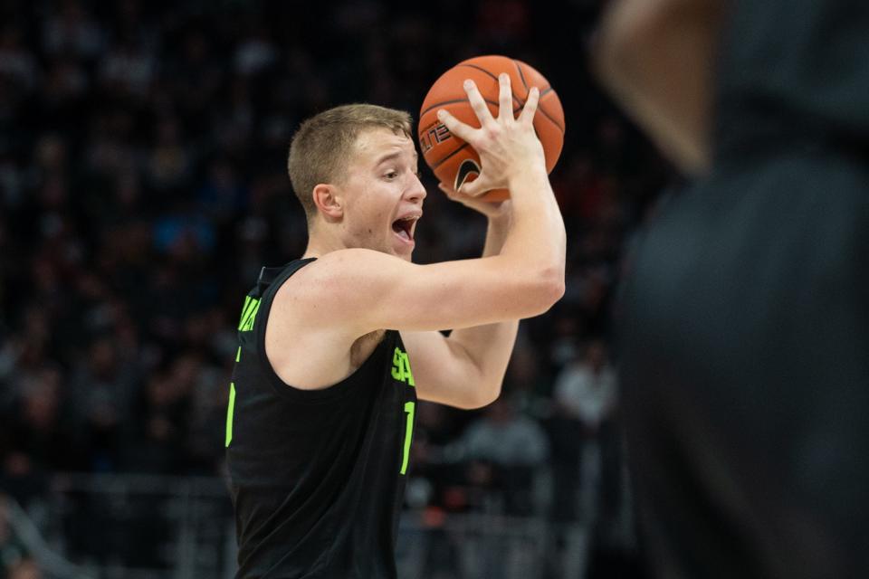 Michigan State forward Thomas Kithier looks for an open pass during the first half on Saturday, Dec. 14, 2019, at Little Caesars Arena.
