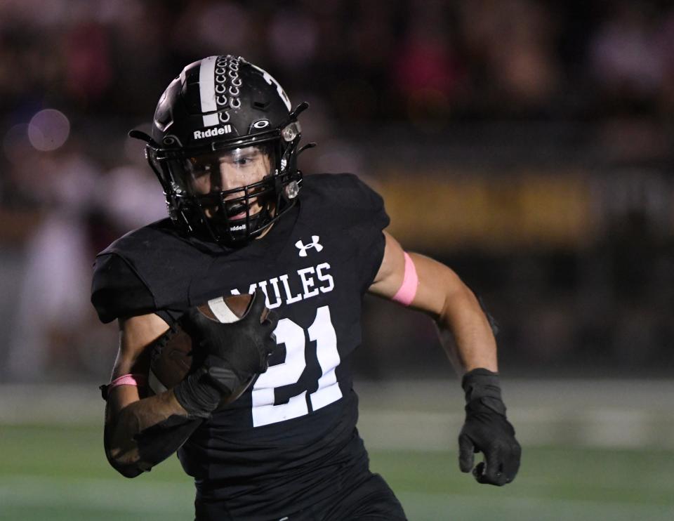 Muleshoe's Daniel Sianez runs with the ball against Bushland in a District 2-3A football game, Friday, Oct. 6, 2023, at Benny Douglas Stadium in Muleshoe.