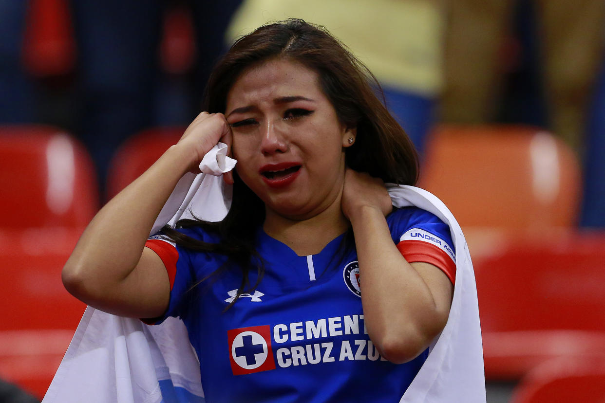 MEXICO CITY, MEXICO - DECEMBER 16: Supporter of Cruz Azul reacts during the final second leg match between Cruz Azul and America as part of the Torneo Apertura 2018 Liga MX at Azteca Stadium on December 16, 2018 in Mexico City, Mexico. (Photo by Mauricio Salas/Jam Media/Getty Images)