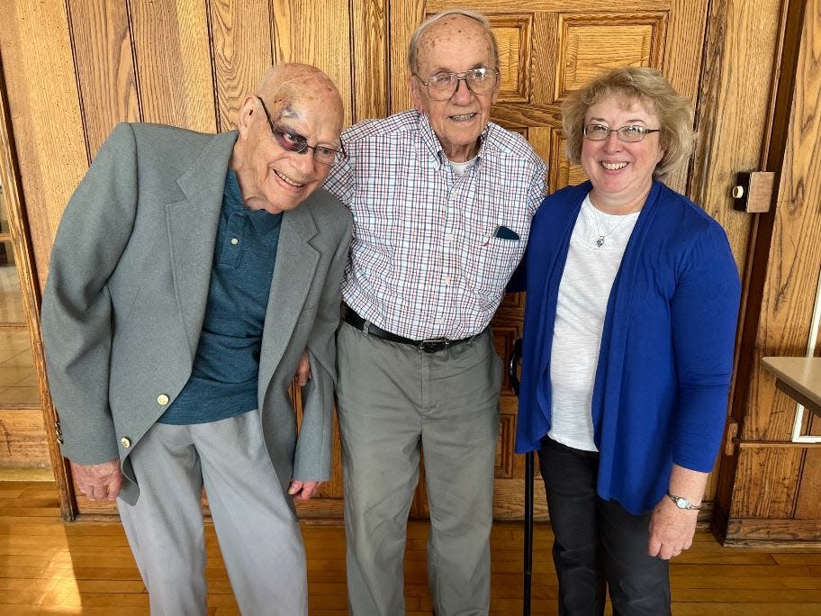 Joe Zelasko, center, a retired teacher who recently turned 90, was honored by the Alliance Historical Society on June 29, 2023. Zelasko is stepping down from the society's board of trustees after 52 years of service. At left is Frank Woolf, another retired board member who served for many years alongside Zelasko. At right is Alliance Historical Society President Karen Perone.