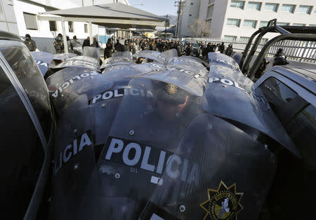 Police block the entrance to the Topo Chico prison in Monterrey, Mexico, February 11, 2016. REUTERS/Daniel Becerril