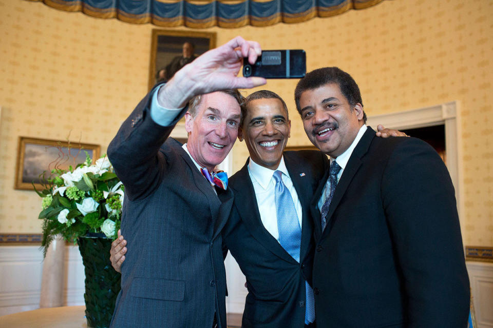 Obama poses for a selfie with Bill Nye (left) and Neil DeGrasse Tyson in the Blue Room prior to the White House Student Film Festival, Feb. 28, 2014.