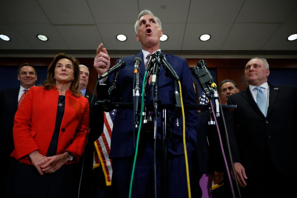 Flanked by members of his incoming leadership team, House Minority Leader Kevin McCarthy (R-CA) (C) talks to reporters after the House Republican Conference voted for him to be its nominee for Speaker of the House.