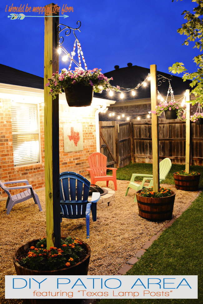 <p>A term made up by blogger Kristi, "Texas Lamp Posts" can create the feeling of an outdoor room, especially when vintage lights are added.</p><p><strong>See more at <a href="http://www.ishouldbemoppingthefloor.com/2015/05/diy-patio-area-with-texas-lamp-posts.html" rel="nofollow noopener" target="_blank" data-ylk="slk:I Should Be Mopping the Floor;elm:context_link;itc:0;sec:content-canvas" class="link ">I Should Be Mopping the Floor</a>.</strong></p><p><strong><a class="link " href="https://www.amazon.com/Backyard-Hanging-Outdoor-Pergola-Deckyard/dp/B00RQHBZVS/ref=sr_1_4?tag=syn-yahoo-20&ascsubtag=%5Bartid%7C10050.g.3404%5Bsrc%7Cyahoo-us" rel="nofollow noopener" target="_blank" data-ylk="slk:Shop string lights;elm:context_link;itc:0;sec:content-canvas">Shop string lights</a><br></strong></p>